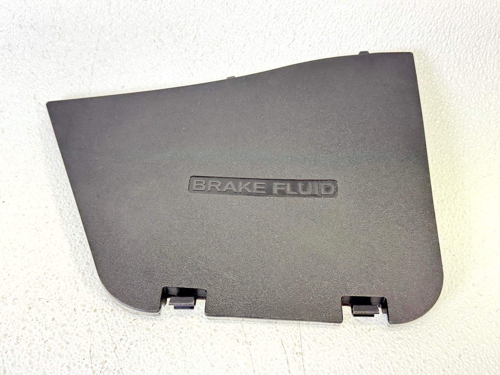 14-22 INFINITI Q50 LEFT DRIVER SIDE BRAKE FLUID RESERVOIR LID TRIM COVER