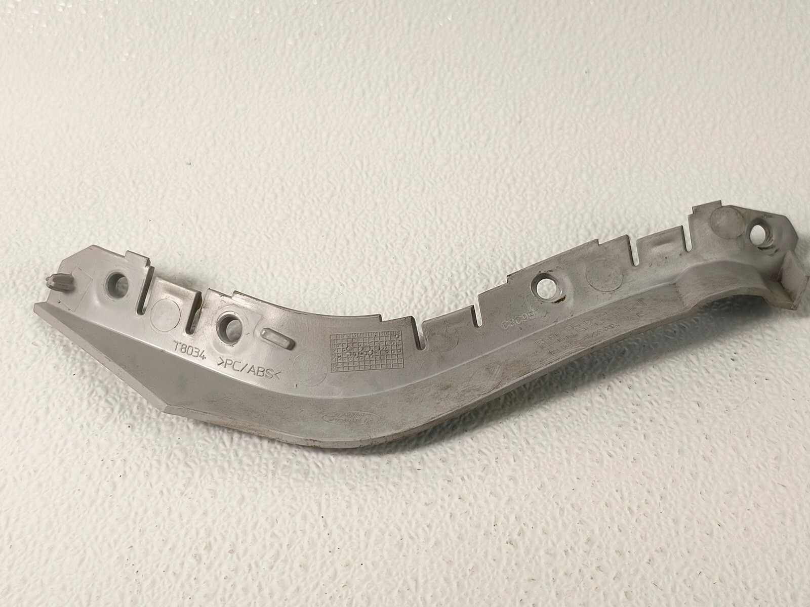 12-19 RANGE ROVER EVOQUE REAR RIGHT RH PASS SIDE BUMPER MOUNT BRACKET
